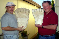 Greg and Rex Holding Casts