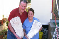 Rex and Heather holding Casts